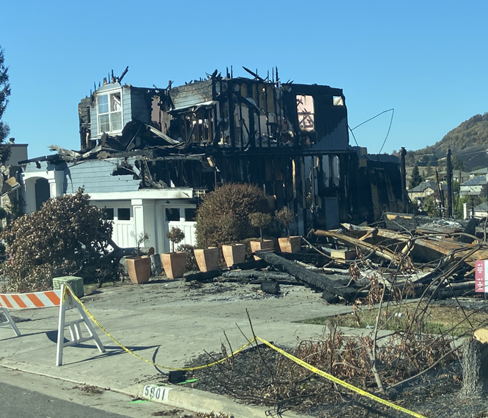 wildfire damaged home