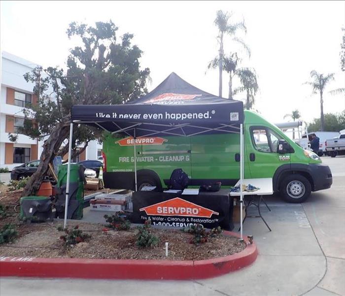SERVPRO ¨Like it never even happened¨ tent outside of a commercial loss.
