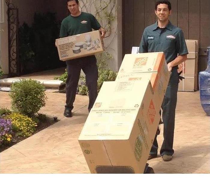people moving boxes