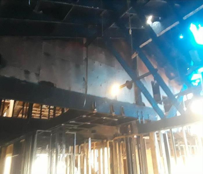 Fire damage inside empty structure.